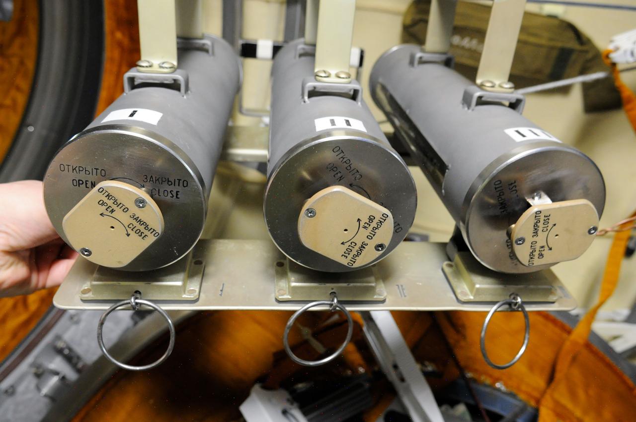 iss028e020313 (8/2/2011) --- A view of the Biorisk-[MSN] platform with three containers to be installed on the exterior of the Pirs Docking Compartment (DC1) during Russian EVA-29 (Extravehicular Activity). The Influence of Factors of the Space Environment on the Condition of the System of Microorganisms-Hosts Relating to the Problem of Environmental Safety of Flight Techniques and Planetary Quarantine (Biorisk) investigation aims to obtain new data on physical and genetic changes in bacteria and fungi typically found on spacecraft equipment, and also in various biological test objects (higher plant seeds, dormant forms of lower crustaceans) under exposure in the interior ISS compartments and on the exterior ISS surfaces.