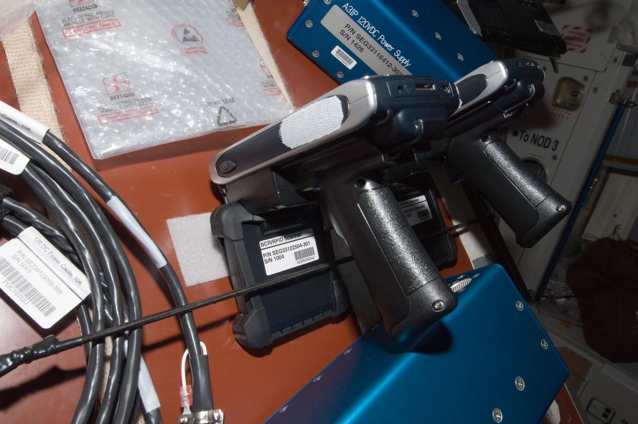 iss028e025734 (8/15/2011) --- Photo documentation of the BCR/RFID Scanner taken aboard the International Space Station(ISS). The RFID-Enabled Autonomous Logistics Management (REALM) (RFID Logistics Awareness) investigation tests a radio-based inventory control system to keep track of everything inside the football-field-sized ISS. Some aspects of the technology are commonly used on Earth, but other aspects are experimental in nature.