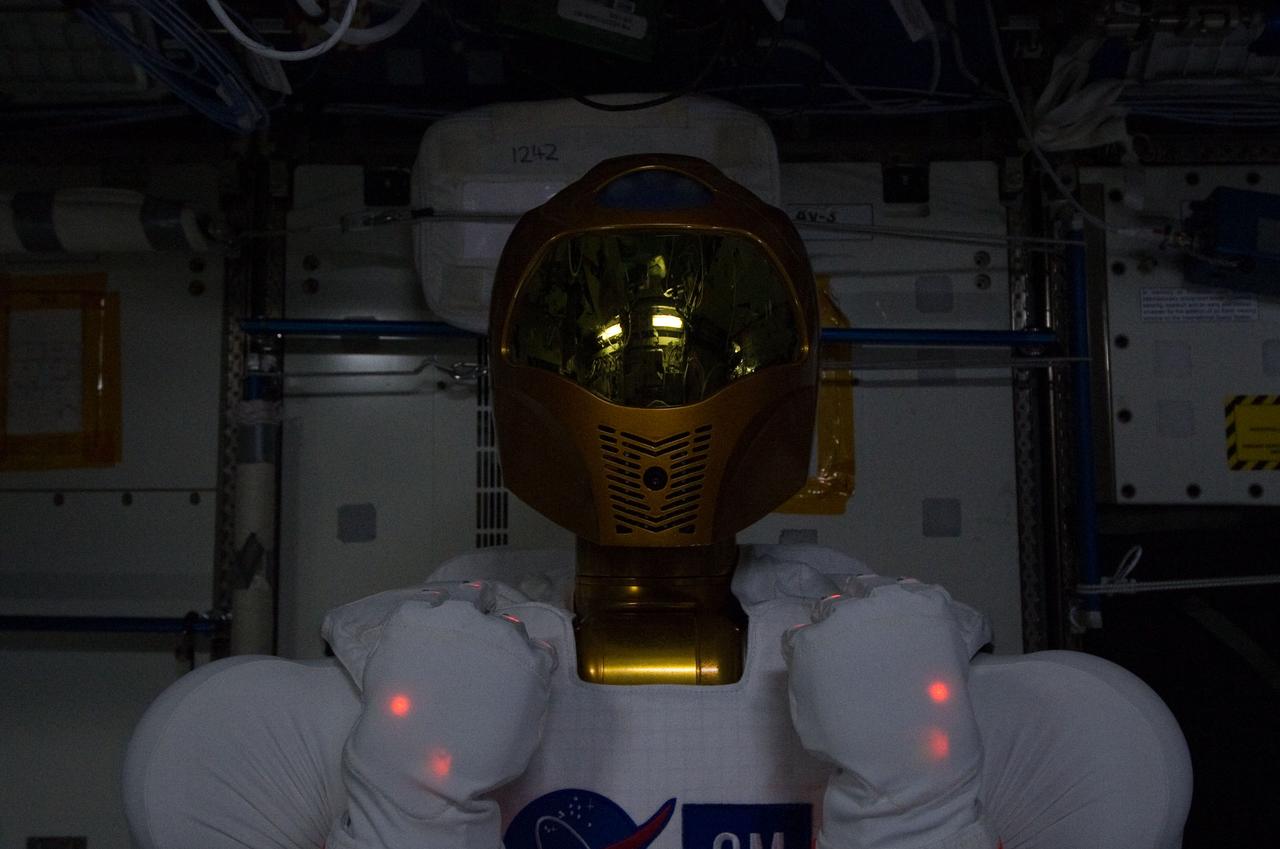 ISS028-E-030755 (22 Aug. 2011) --- Robonaut 2 ? the first dexterous humanoid robot in space ? is pictured in the Destiny laboratory of the International Space Station shortly after it was powered up and teams on the ground sent power to the robot for the first time in space.
