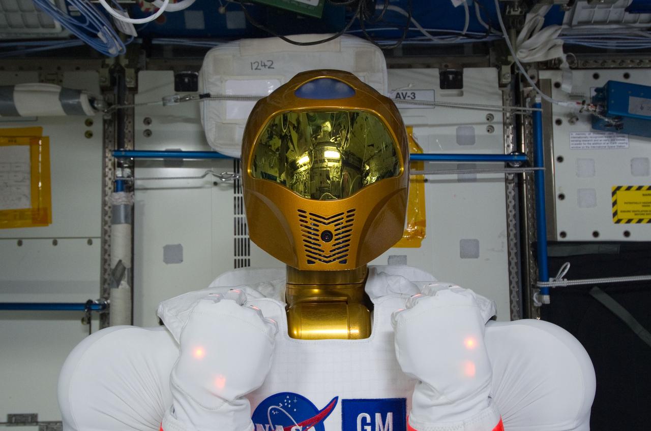 ISS028-E-030757 (22 Aug. 2011) --- Robonaut 2 ? the first dexterous humanoid robot in space ? is pictured in the Destiny laboratory of the International Space Station shortly after it was powered up and teams on the ground sent power to the robot for the first time in space.