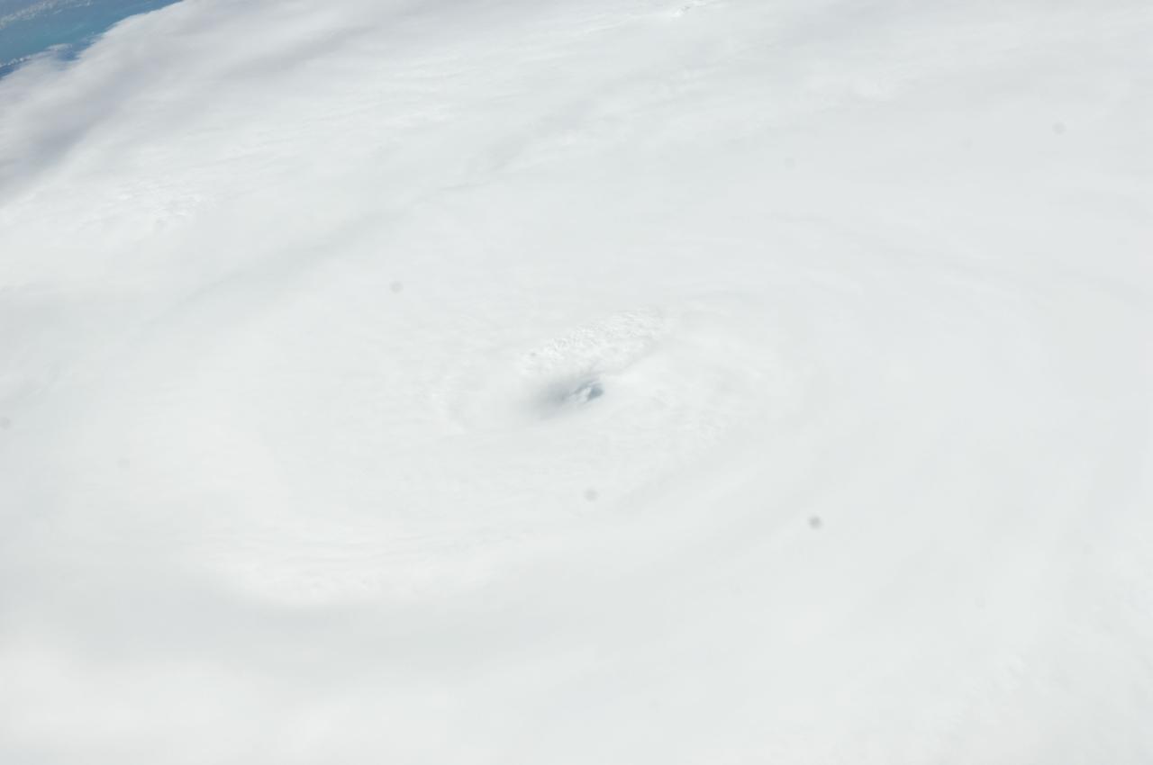 ISS028-E-031904 (24 Aug. 2011) --- This photo of Hurricane Irene was photographed from onboard the International Space station at 19:14:14 GMT on Aug. 24, 20ll. The image, captured  with the aid of a 70?mm lens, reveals the eye at center frame.