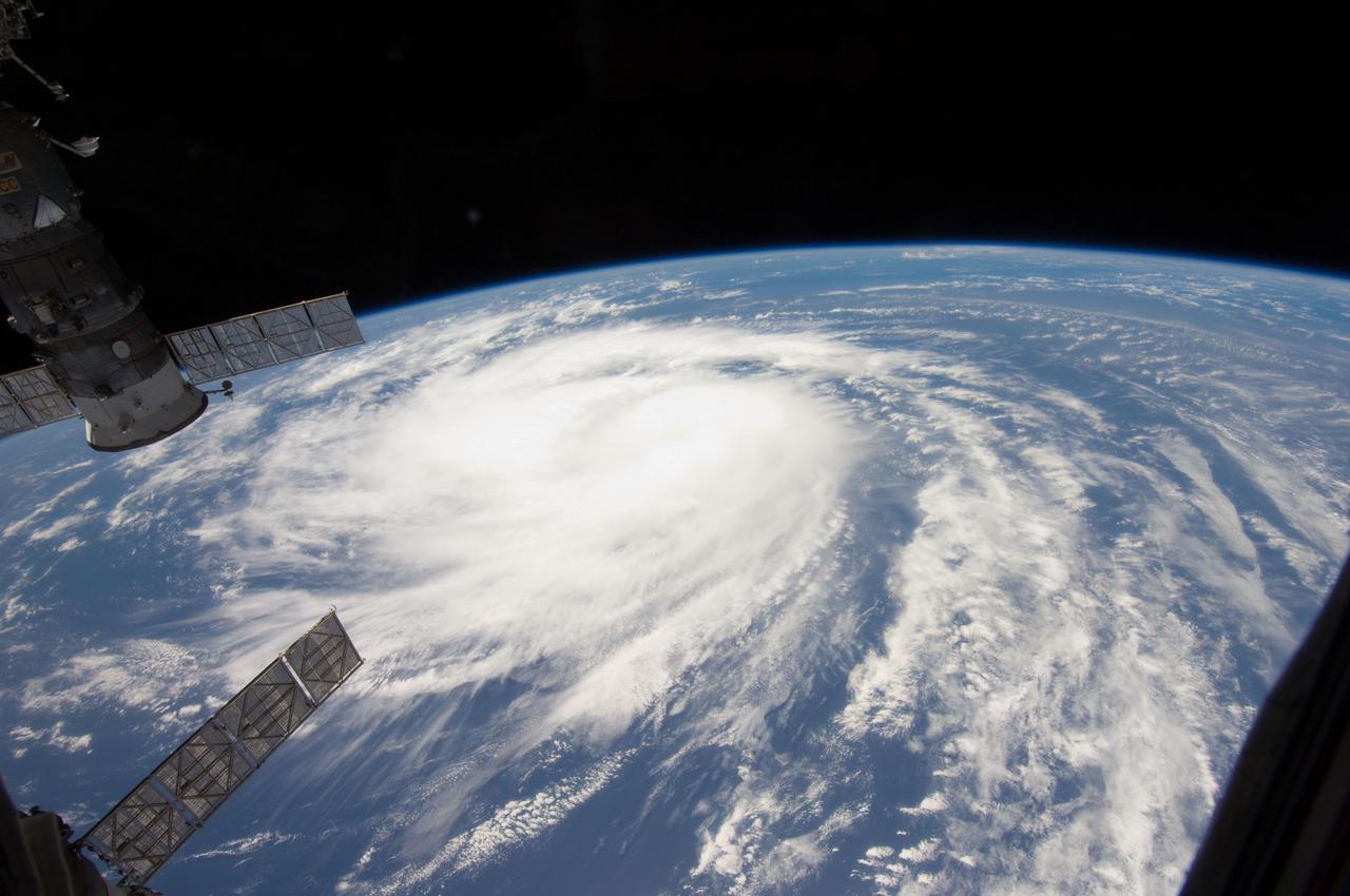 ISS028-E-035382 (31 Aug. 2011) --- Katia was a tropical storm gathering energy over the Atlantic Ocean when one of the Expedition 28 crew members took this photo on Aug. 31 from aboard the International Space Station. The picture, taken with a 12-mm focal length, was captured at 14:09:01 GMT. Later in the day Katia was upgraded to hurricane status. Two Russian spacecraft -- a Progress and a Soyuz --can be seen parked at the orbital outpost on the left side of the frame.