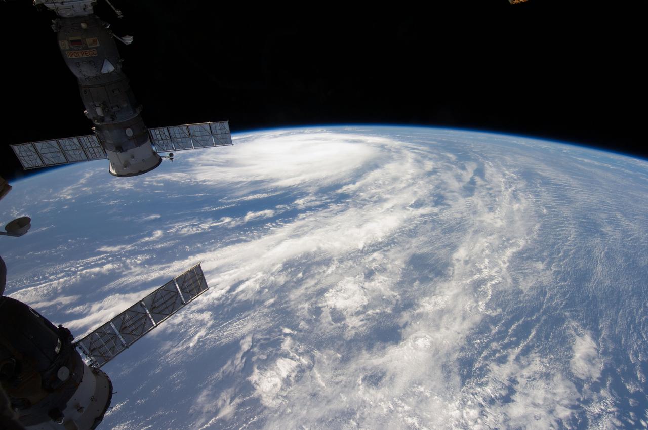 ISS028-E-035407 (31 Aug. 2011) --- Katia was a tropical storm gathering energy over the Atlantic Ocean when one of the Expedition 28 crew members took this oblique photo on Aug. 31 from aboard the International Space Station. The picture, taken with a 12-mm focal length, was captured at 14:10:16 GMT. Later in the day Katia was upgraded to hurricane status. Two Russian spacecraft -- a Progress and a Soyuz -- can be seen parked at the orbital outpost on the left side of the frame.