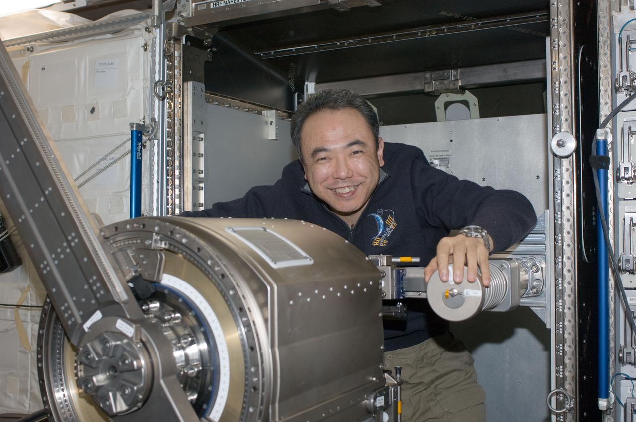 ISS028-E-035617 (31 Aug. 2011) --- Japan Aerospace Exploration Agency astronaut Satoshi Furukawa, Expedition 28 flight engineer, works with Muscle Atrophy Research & Exercise System (MARES) hardware in the Columbus laboratory of the International Space Station.