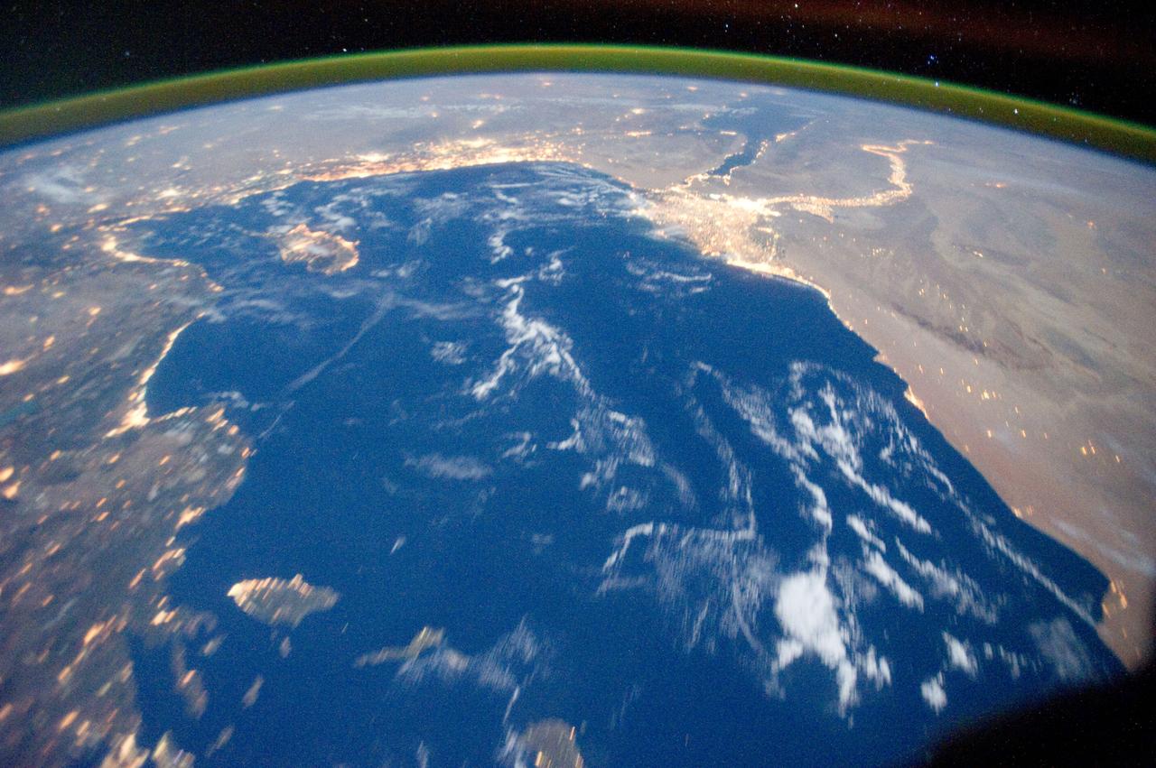 ISS029-E-031143 (15 Oct. 2011) --- One of the Expedition 29 crew members aboard the International Space Station recorded this oblique view showing the Mediterranean Sea area, including parts of Turkey, the Nile River and the river's delta, and the Sinai Peninsula, on Oct. 15, 2011. At first look, the image appears to have been photographed in daylight, but actually it was taken at 01:01:26 GMT. Some areas of the photo like the river and river delta appear as the brightest areas because of either man-made lighting (mostly incandescent) or man-made lighting reflected off nearby surfaces. The other areas appear to be illuminated naturally by moonlight, starlight, or back-scattered light from the atmosphere. A 20-mm focal length was used to record the image.