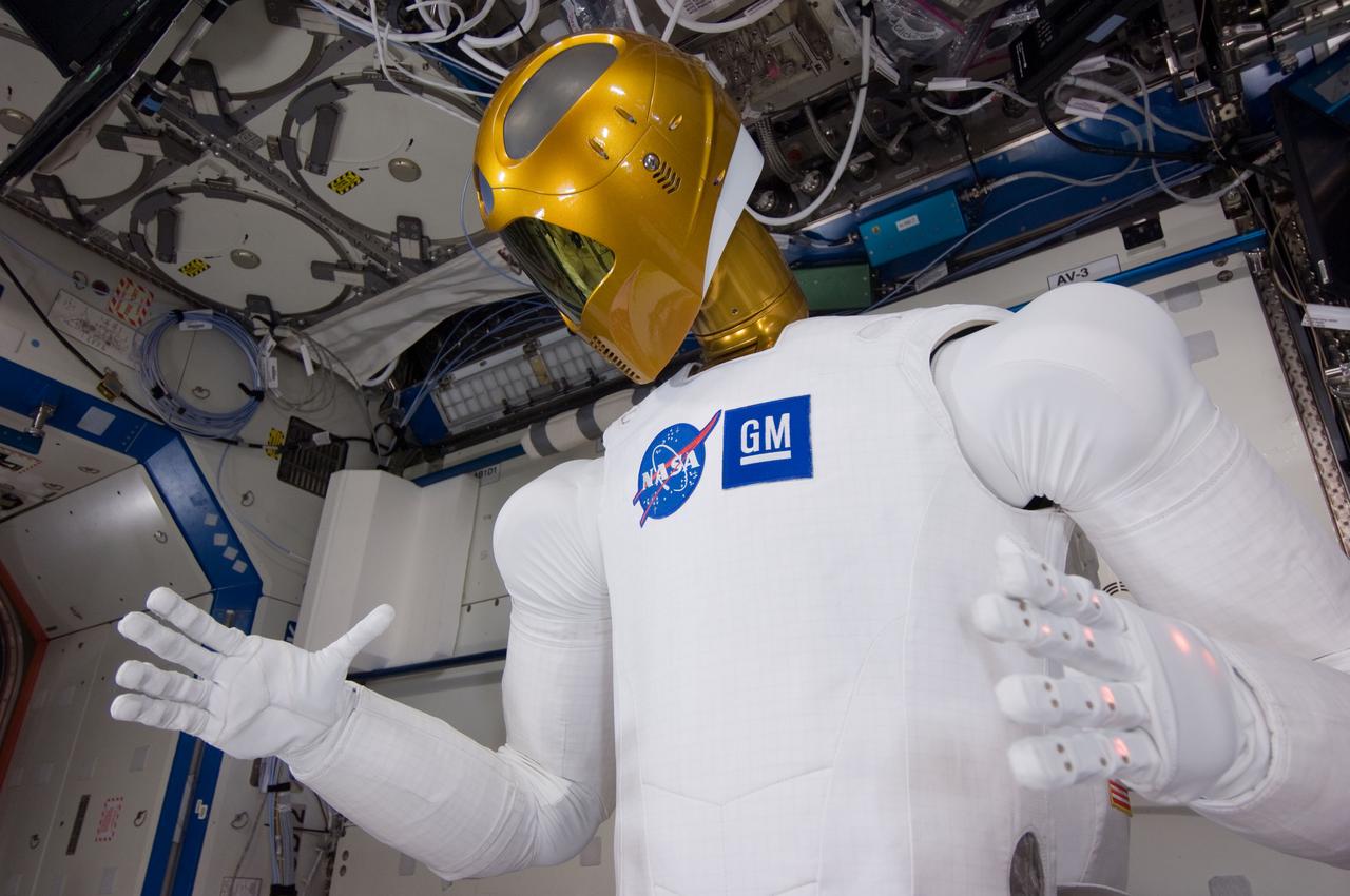 ISS029-E-039234 (4 Nov. 2011) --- Robonaut 2 -- the first dexterous humanoid robot in space ? is pictured in the Destiny laboratory of the International Space Station. NASA astronaut Mike Fossum, Expedition 29 commander; and Japan Aerospace Exploration Agency astronaut Satoshi Furukawa (both out of frame), flight engineer, spent several hours in Destiny checking out and operating R2.