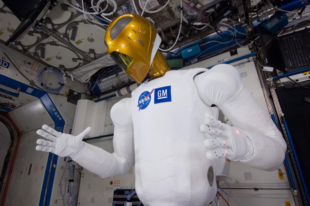 ISS029-E-039235 (4 Nov. 2011) --- Robonaut 2 -- the first dexterous humanoid robot in space ? is pictured in the Destiny laboratory of the International Space Station. NASA astronaut Mike Fossum, Expedition 29 commander; and Japan Aerospace Exploration Agency astronaut Satoshi Furukawa (both out of frame), flight engineer, spent several hours in Destiny checking out and operating R2.