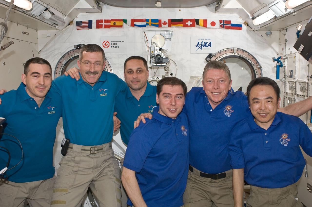 ISS029-E-043144 (20 Nov. 2011) --- Expedition 28/29 and Expedition 29/30 crew members pose for a group portrait in the International Space Station?s Kibo laboratory following the ceremony of Changing-of-Command from Expedition 29 to Expedition 30. Pictured from the left are Russian cosmonaut Anatoly Ivanishin, Expedition 30 flight engineer; NASA astronaut Dan Burbank, Expedition 30 commander; Anton Shkaplerov, Expedition 30 flight engineer; Russian cosmonaut Sergei Volkov, Expedition 29 flight engineer; NASA astronaut Mike Fossum, Expedition 29 commander; and Japan Aerospace Exploration Agency astronaut Satoshi Furukawa, Expedition 29 flight engineer.