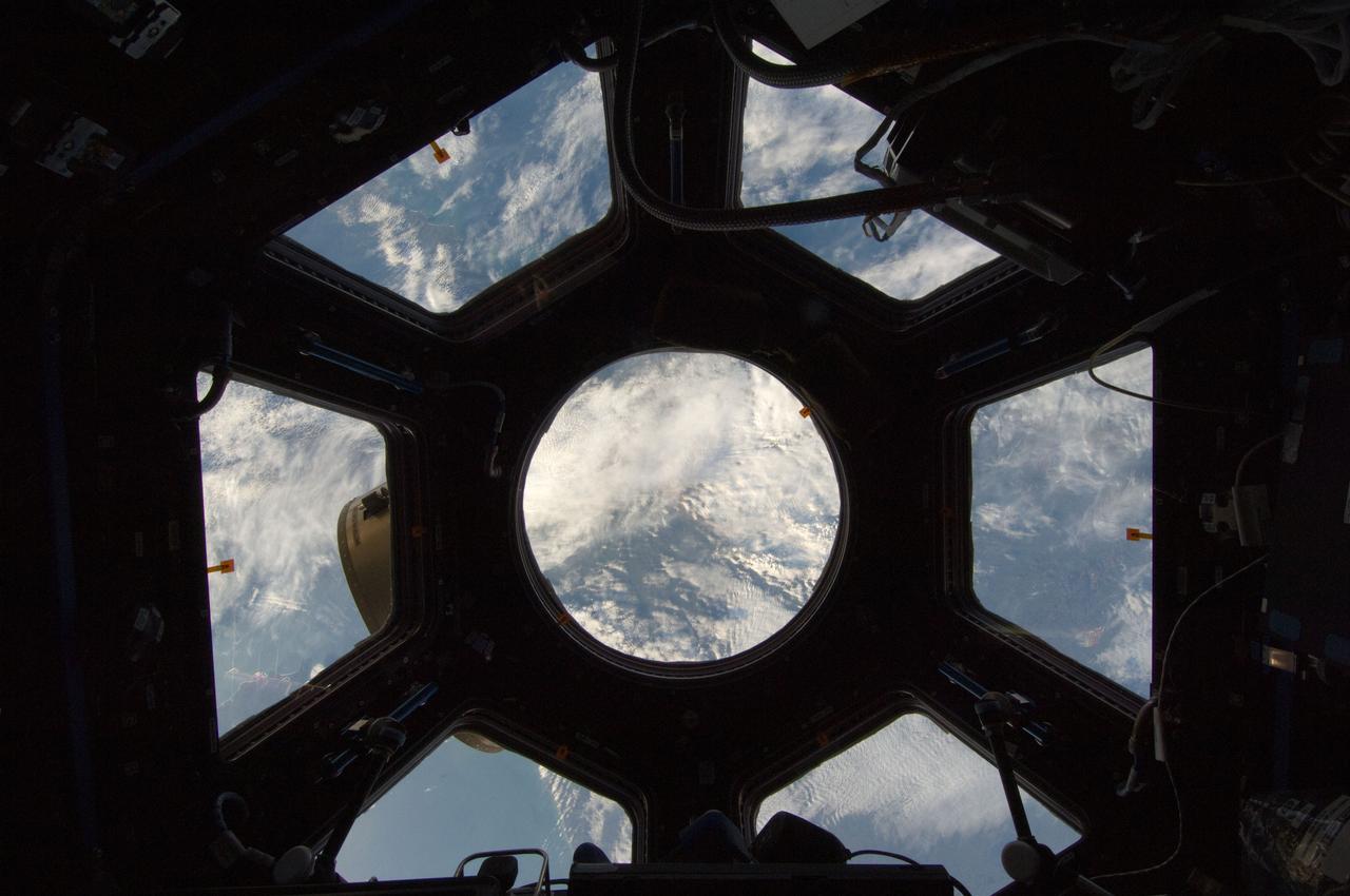 ISS029-E-043374 (19 Nov. 2011) --- A blue and white part of Earth, as seen through the windows in the Cupola, is featured in this image photographed by an Expedition 29 crew member on the International Space Station.