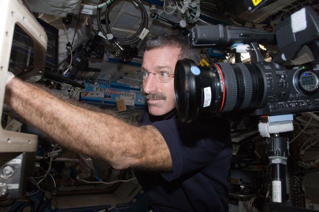 NASA image: Burbank works at the LMM in the FIR/FCF in the U.S. Laboratory