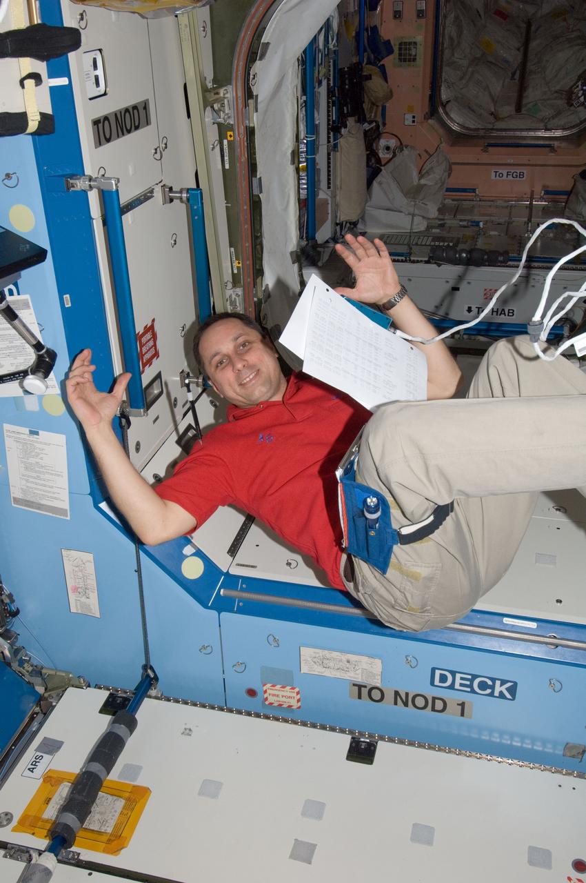 ISS030-E-007570 (3 Dec. 2011) --- Russian cosmonaut Anton Shkaplerov, Expedition 30 flight engineer, is pictured in the hatch between the Destiny laboratory and Unity node of the International Space Station.