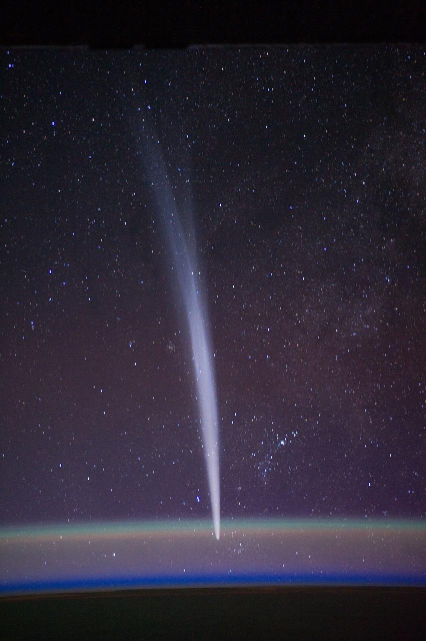 ISS030-E-015472 (22 Dec. 2011) --- Comet Lovejoy is visible near Earth’s horizon in this nighttime image photographed by NASA astronaut Dan Burbank, Expedition 30 commander, onboard the International Space Station on Dec. 22, 2011.