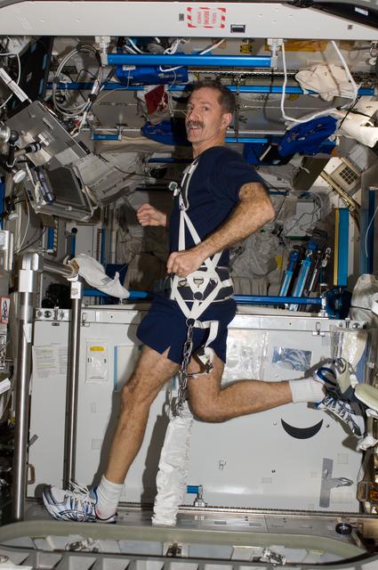 NASA image: Burbank exercises on the T2 COLBERT