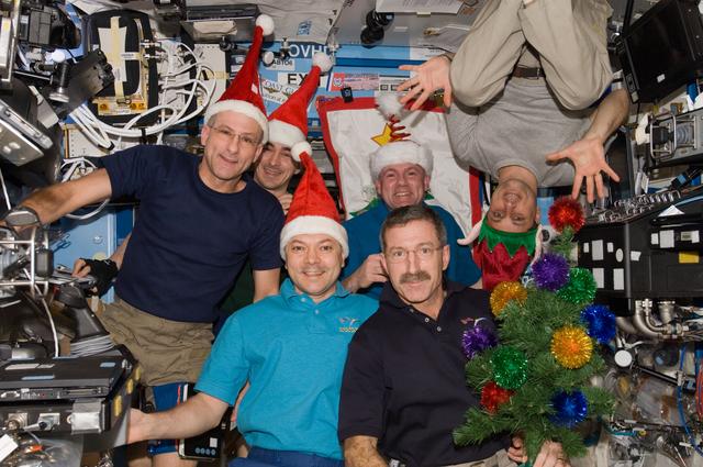 NASA image: Expedition 30 Crew Members celebrate Christmas in the U.S. Laboratory