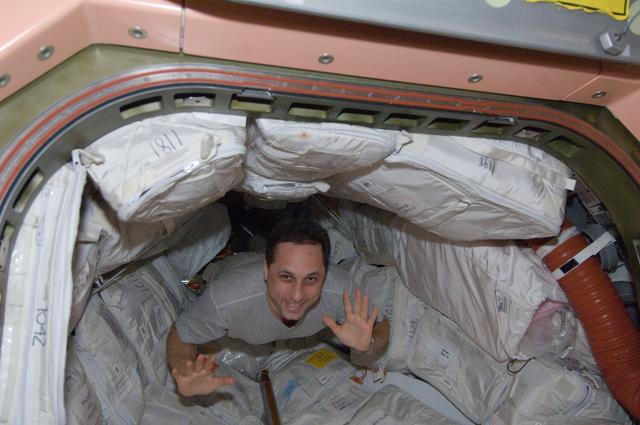 NASA image: Shkaplerov floats through hatch in the Node 1