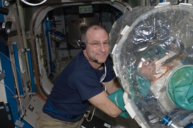 NASA image: Pettit works on a SPHERES in the Portable Glovebox in the U.S. Laboratory