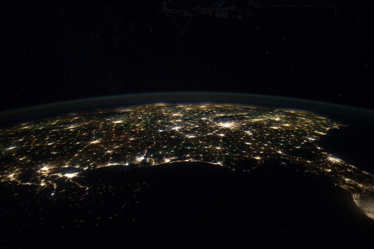 ISS030-E-055532 (29 Jan. 2012) --- This north-looking nighttime panorama of much of the land mass of the eastern two-thirds of the contiguous United States was photographed by one of the Expedition 30 crew members aboard the International Space Station as it was moving over the Gulf of Mexico on Jan. 29, 2012. In this series, the 24-mm images cover the area from the Atlantic Coast (right) to the eastern edge of the southwestern states and the western Gulf of Mexico. In this frame, Houston is near the left edge. Most of the Florida peninsula is easily recognizable at right edge. The lights of dozens of large metropolitan areas are visible.