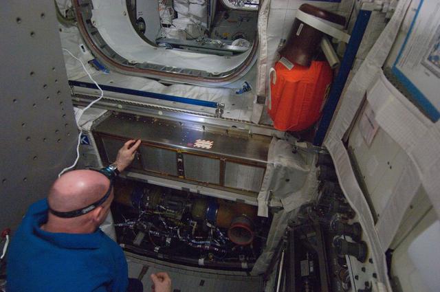 NASA image: Kuipers during scheduled inspection and extensive cleanup of ventilation systems