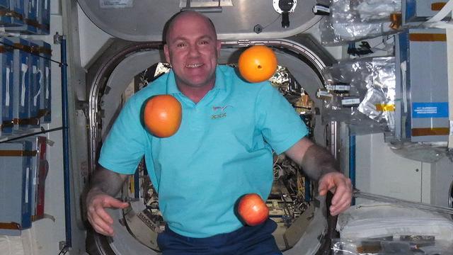 ISS030-E-116840 (2 Feb. 2012) --- European Space Agency astronaut Andre Kuipers, Expedition 30 flight engineer, is pictured near fruit floating freely in the Unity node of the International Space Station.