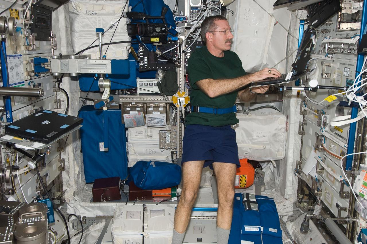 ISS030-E-117431 (1 Feb. 2012) --- In the Columbus laboratory of the International Space Station, NASA astronaut Dan Burbank, Expedition 30 commander, enters data in a computer for the High Salt Diet protocol of the Sodium Loading in Microgravity (SOLO) experiment.