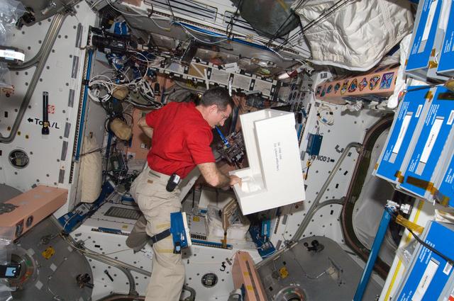 NASA image: Burbank works on the WRS-1 in the Node 1