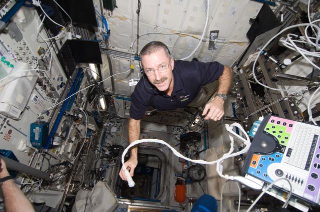 NASA image: Burbank uses the ICV Resting Echo Scan on Expedition 30 crew member