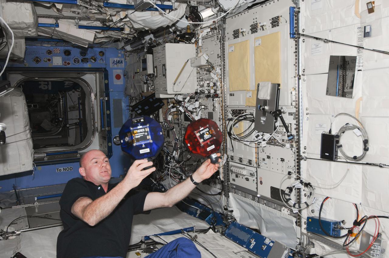 ISS030-E-156313 (23 Jan. 2012) --- European Space Agency astronaut Andre Kuipers, Expedition 30 flight engineer, works with the Synchronized Position Hold, Engage, Reorient, Experimental Satellites Zero Robotics (SPHERES ZR) experiment in the Kibo laboratory of the International Space Station.