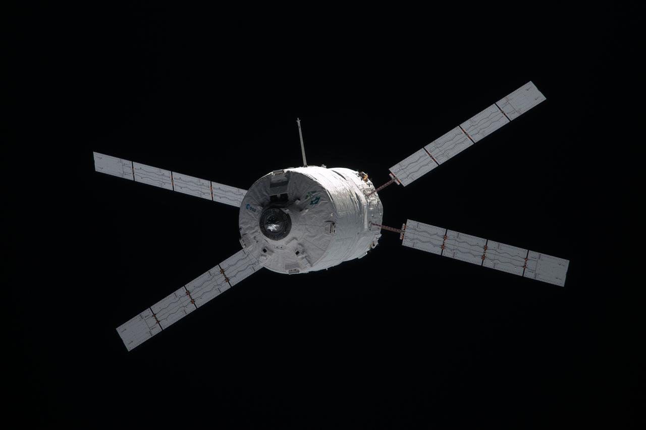 ISS030-E-174974 (28 March 2012) --- European Space Agency?s ?Edoardo Amaldi? Automated Transfer Vehicle-3 (ATV-3) approaches the International Space Station. The unmanned cargo spacecraft docked to the space station at 6:31 p.m. (EDT) on March 28, 2012, delivering 220 pounds of oxygen, 628 pounds of water, 4.5 tons of propellant, and nearly 2.5 tons of dry cargo, including experiment hardware, spare parts, food and clothing.
