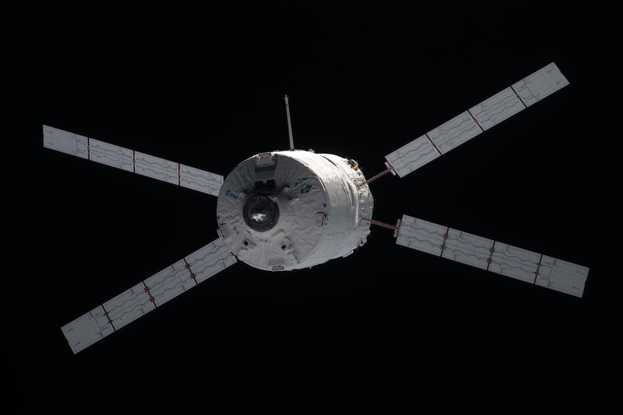 ISS030-E-174978 (28 March 2012) --- European Space Agency?s ?Edoardo Amaldi? Automated Transfer Vehicle-3 (ATV-3) approaches the International Space Station. The unmanned cargo spacecraft docked to the space station at 6:31 p.m. (EDT) on March 28, 2012, delivering 220 pounds of oxygen, 628 pounds of water, 4.5 tons of propellant, and nearly 2.5 tons of dry cargo, including experiment hardware, spare parts, food and clothing.
