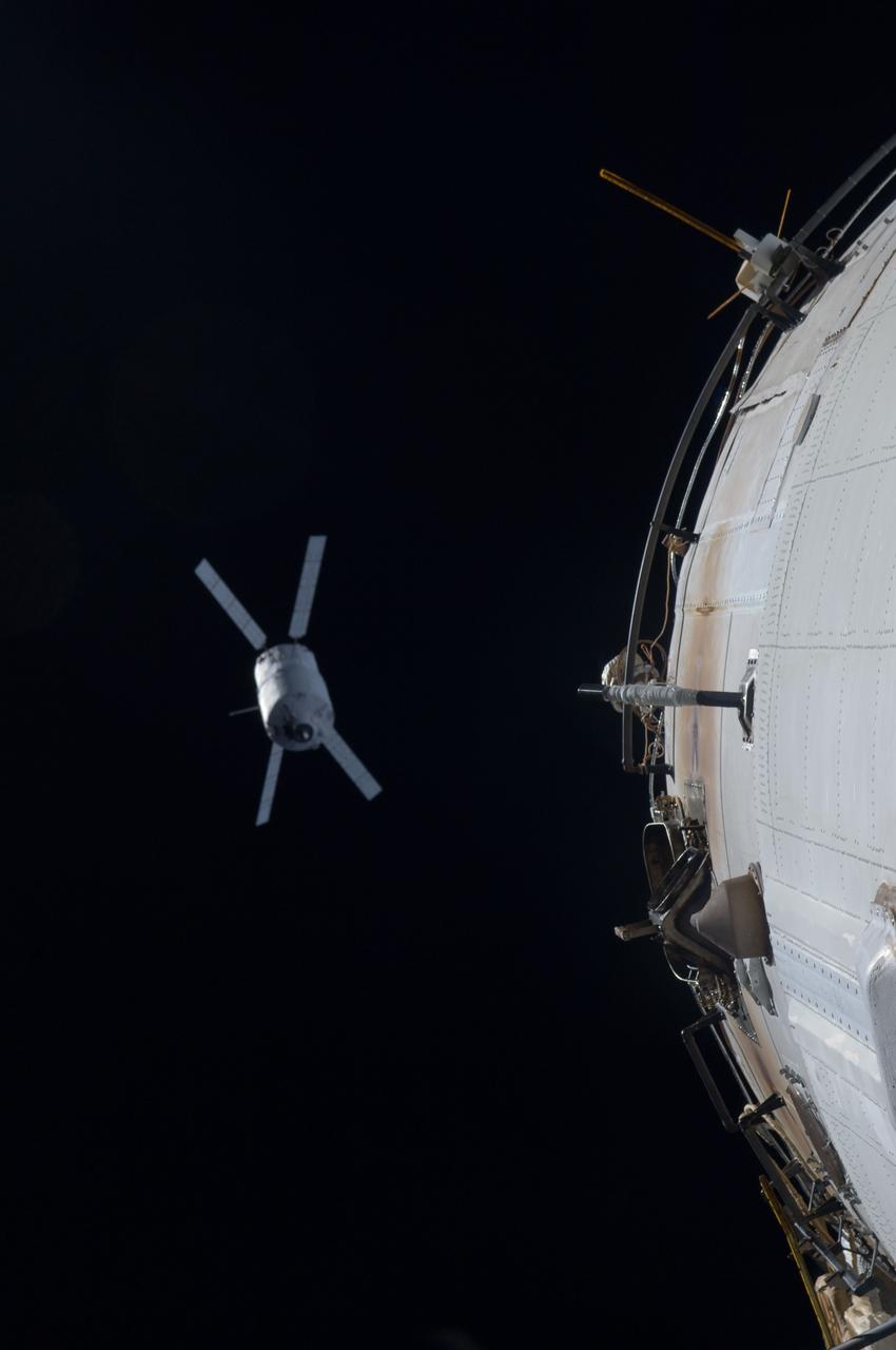 ISS030-E-175647 (28 March 2012) --- European Space Agency?s ?Edoardo Amaldi? Automated Transfer Vehicle-3 (ATV-3) approaches the International Space Station. The unmanned cargo spacecraft docked to the space station at 6:31 p.m. (EDT) on March 28, 2012, delivering 220 pounds of oxygen, 628 pounds of water, 4.5 tons of propellant, and nearly 2.5 tons of dry cargo, including experiment hardware, spare parts, food and clothing.