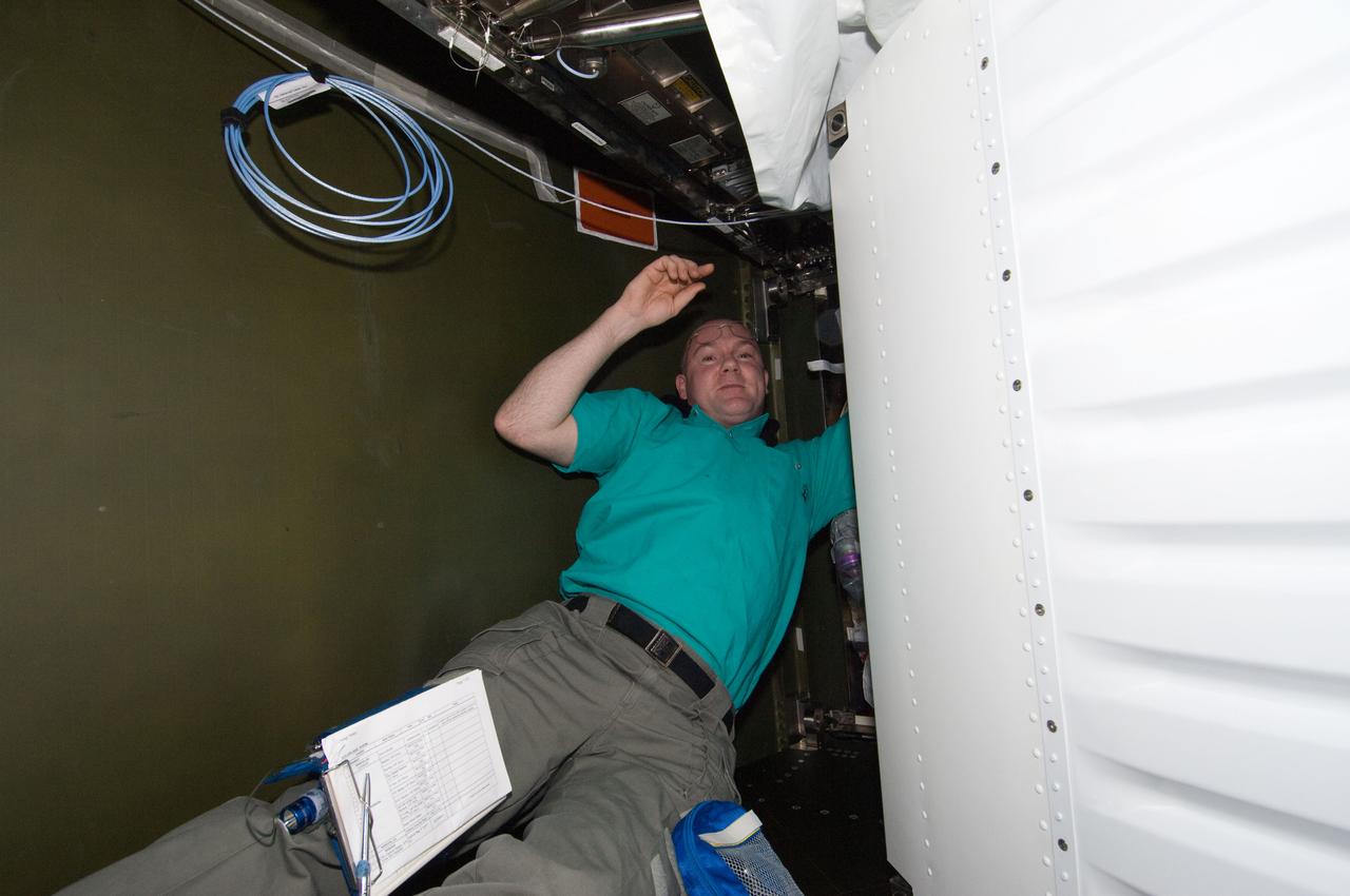 ISS030-E-195126 (4 April 2012) --- European Space Agency astronaut Andre Kuipers, Expedition 30 flight engineer, works on the Multiplexer / Demultiplexer (MDM) 16C Assembly in the Destiny laboratory of the International Space Station.