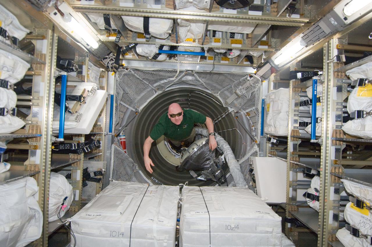 ISS030-E-210842 (6 April 2012) --- European Space Agency astronaut Andre Kuipers, Expedition 30 flight engineer, floats into the Automated Transfer Vehicle (ATV-3) currently docked with the International Space Station.