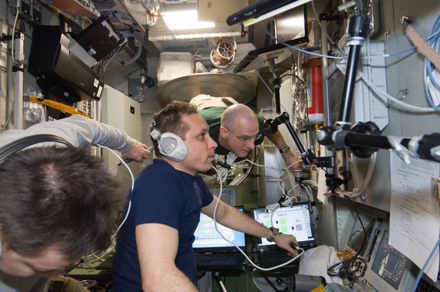 NASA image: Expedition 30 Crewmembers use manual TORU docking system