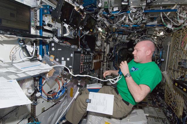 NASA image: Kuipers using communication equipment in the U.S. Laboratory