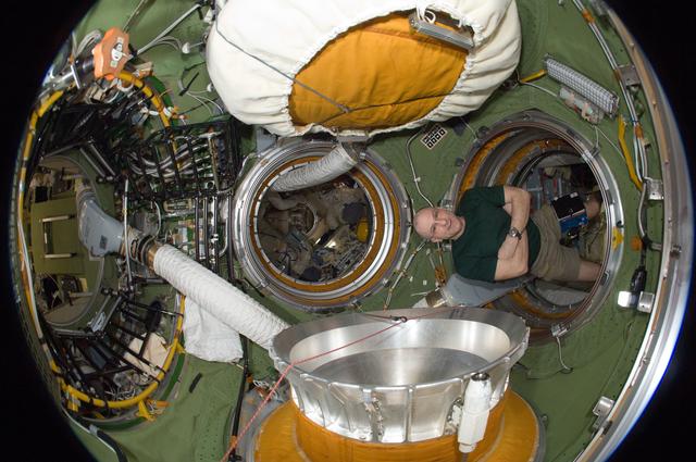 NASA image: Pettit in Fisheye View of SM Transfer Compartment