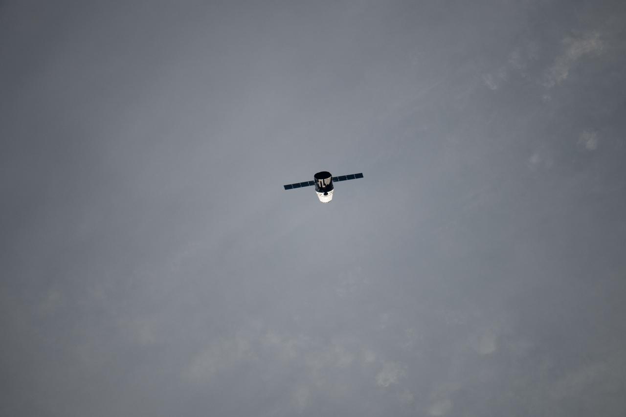 ISS031-E-067401 (24 May 2012) --- The SpaceX Dragon commercial cargo craft approaches the International Space Station on May 24, 2012 for a series of tests to clear it for its final rendezvous and grapple on May 25. At 3:58 a.m. (EDT), Dragon performed a height adjust burn to bring it to a path 2.4 kilometers below the station. During this “fly-under,” Dragon established UHF communication with the station using its Commercial Orbital Transportation Services (COTS) Ultra-high frequency Communication Unit (CUCU). Dragon performed a test of its Relative GPS system, which uses the relative positions of the spacecraft to the space station to determine its location. On May 25, Expedition 31 Flight Engineers Don Pettit and Andre Kuipers will use the Canadarm2 robotic arm to grapple the supply ship about 8:06 a.m., with the berthing to the Earth-facing side of the station’s Harmony node following about 11:20 a.m. Dragon is scheduled to spend about a week docked with the station before returning to Earth on May 31 for retrieval.
