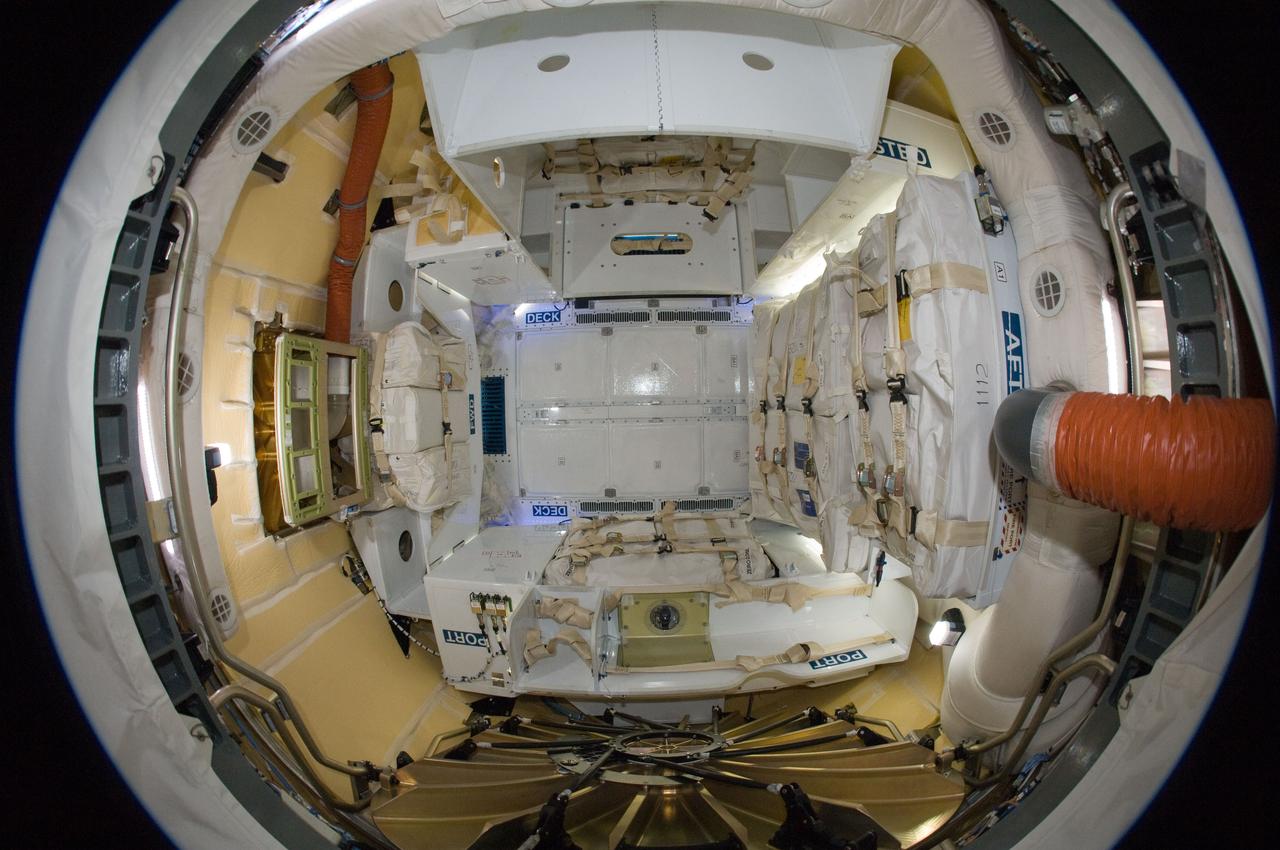 ISS031-E-077779 (26 May 2012) ---  This “fisheye”  image of the inside of the SpaceX Dragon cargo craft was photographed by an Expedition 31 crew  member aboard the International Space Station on May 26, 2012, the day after grapple. The SpaceX Falcon 9 and its Dragon spacecraft launched on Tuesday, May 22, at 3:44 a.m. EDT. This mission is a demonstration flight by Space Exploration Technologies, or SpaceX, as part of its contract with NASA to have private companies launch cargo safely to the International Space Station.