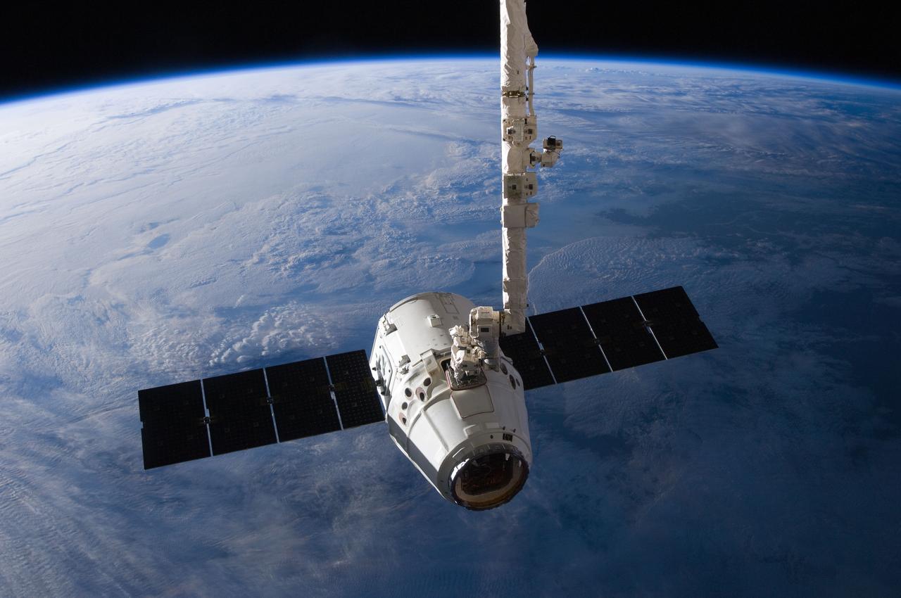 ISS031-E-079326 (31 May 2012) --- The SpaceX Dragon cargo craft is pictured just prior to being released by the International Space Station's Canadarm2 robotic arm on May 31 to allow it to head toward a splashdown in the Pacific Ocean.