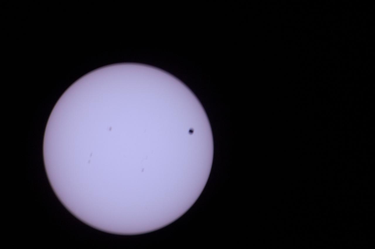 Transit of Venus as seen from the Cupola Module.