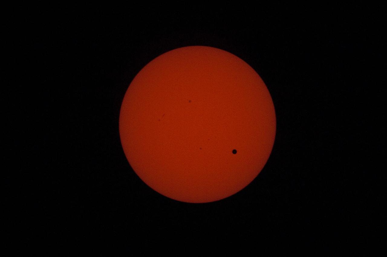 ISS031-E-089025 (5 June 2012) --- Earth’s planetary neighbor Venus passes across the face of the sun on June 5, 2012, seen here from the International Space Station. Expedition 31 crew members aboard the orbital outpost had cameras set up in several locations to record the rare event.