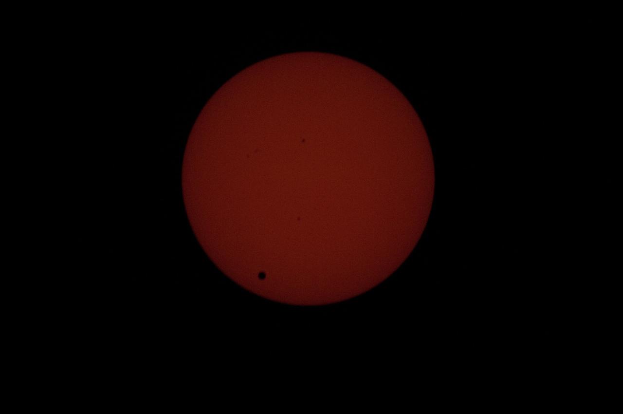 ISS031-E-089075 (5 June 2012) --- Earth’s planetary neighbor Venus passes across the face of the sun on June 5, 2012, seen here from the International Space Station. Expedition 31 crew members aboard the orbital outpost had cameras set up in several locations to record the rare event.