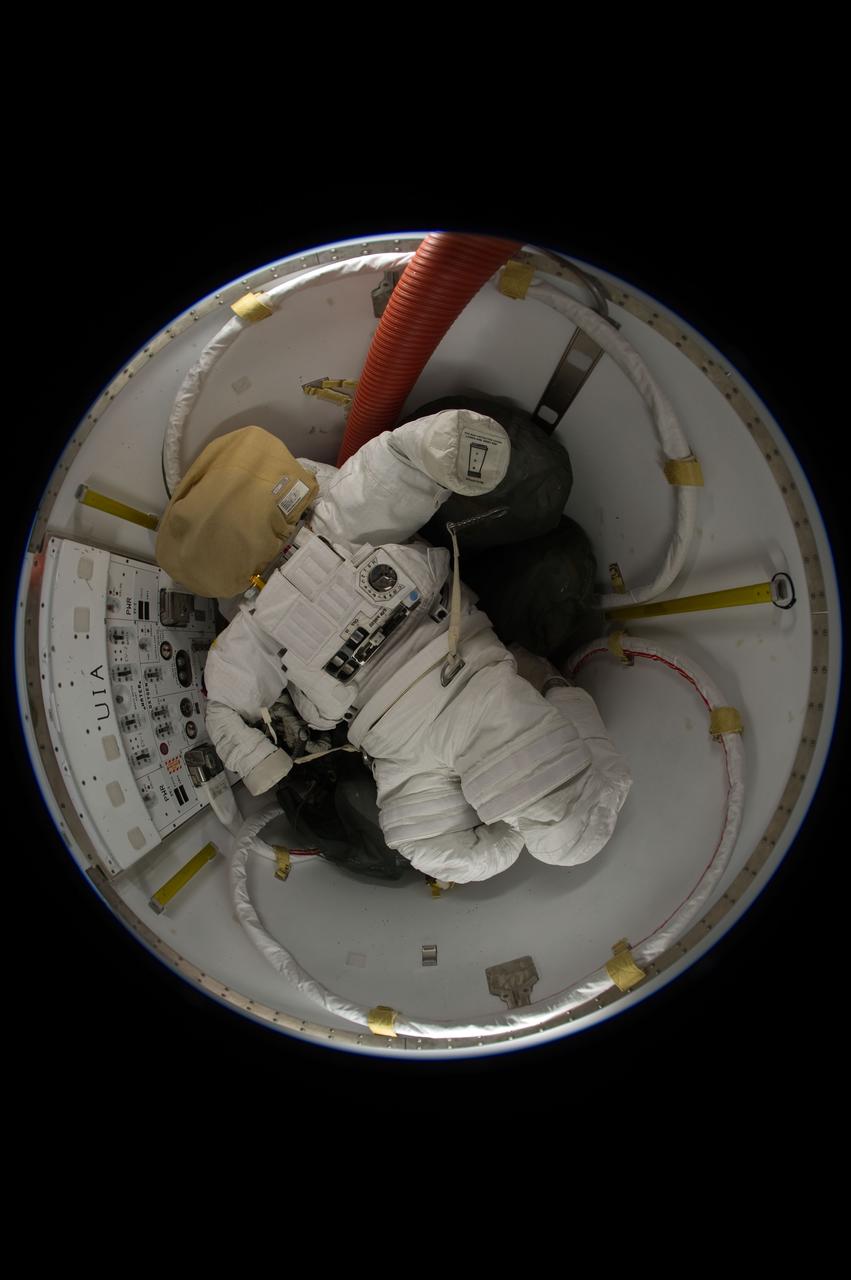 ISS031-E-122199 (14 June 2012 --- A NASA  extravehicular mobility unit (EMU) spacesuit  is seen in the crew lock of the International Space Station's Quest airlock, as photographed by one of the Expedition 31 crew members on June 14, 2012. The next time a human being will be wearing an EMU outside the station is scheduled to come sometime in August.