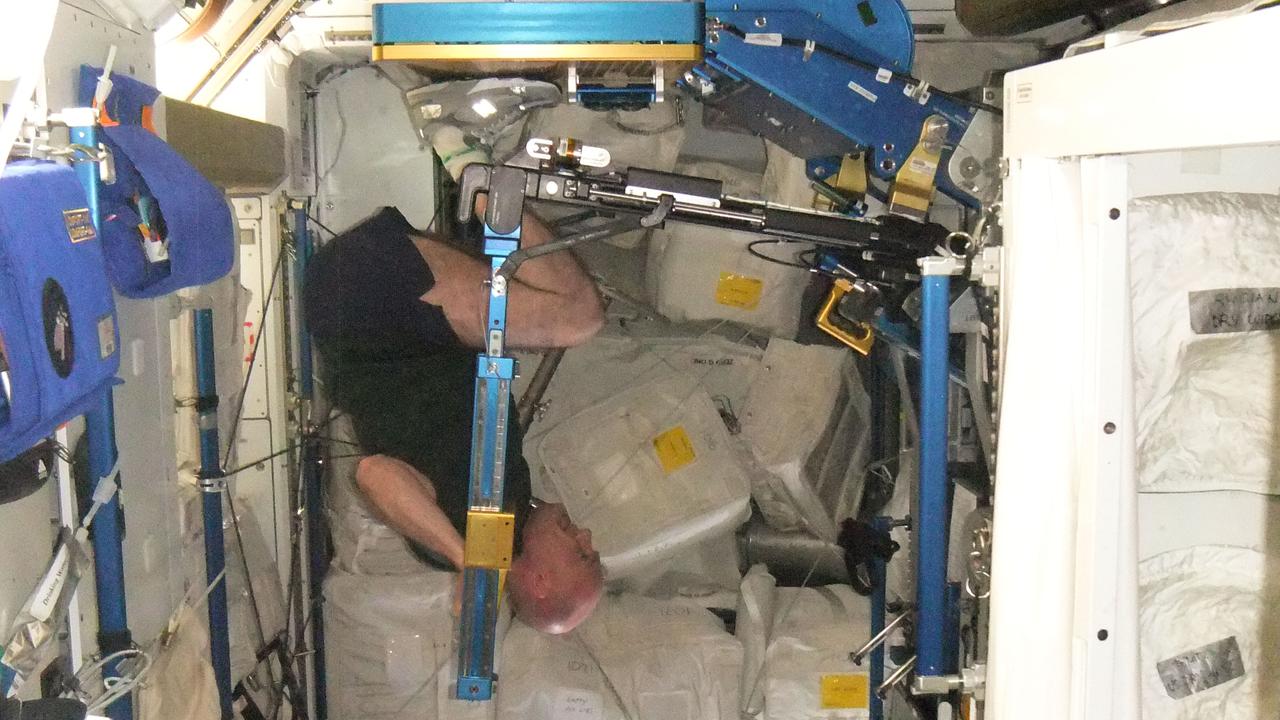 ISS031-E-157839 (5 June 2012) --- European Space Agency astronaut Andre Kuipers, Expedition 31 flight engineer, exercises using the advanced Resistive Exercise Device (aRED) in the Tranquility node of the International Space Station.