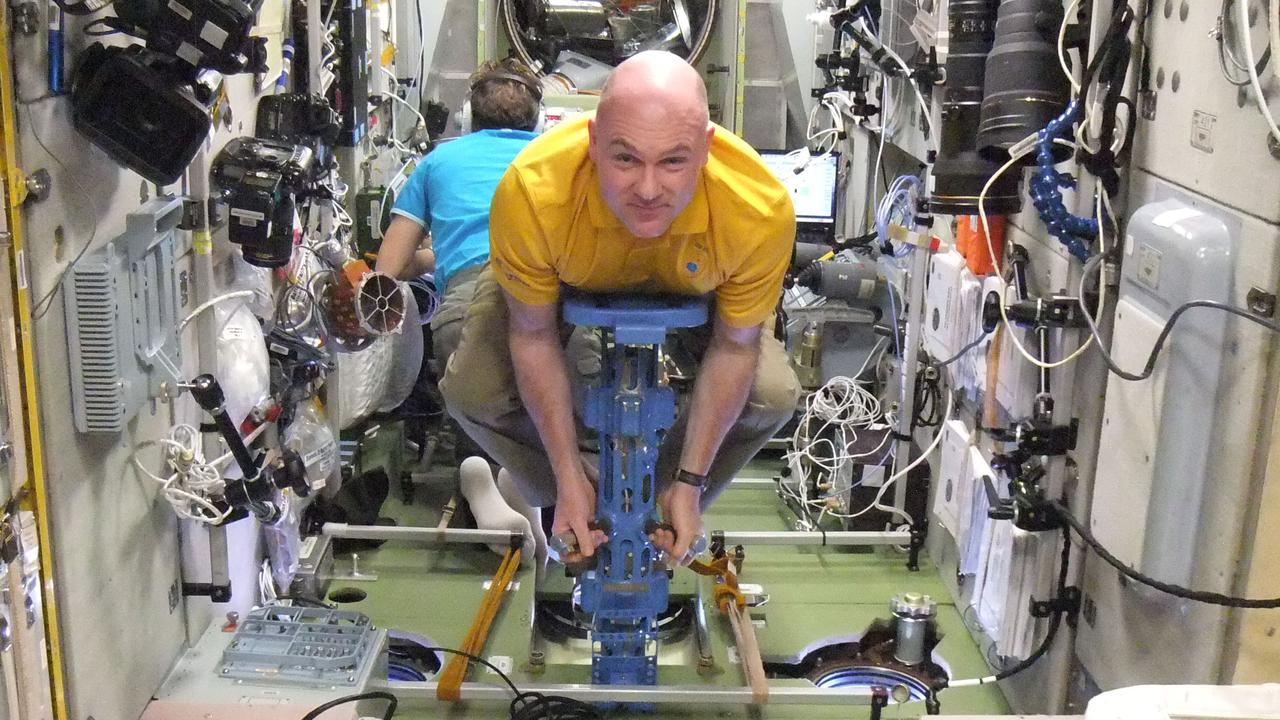 ISS031-E-157943 (26 June 2012) --- European Space Agency astronaut Andre Kuipers, Expedition 31 flight engineer, uses a body mass measurement device (BMMD) in the Zvezda Service Module of the International Space Station.