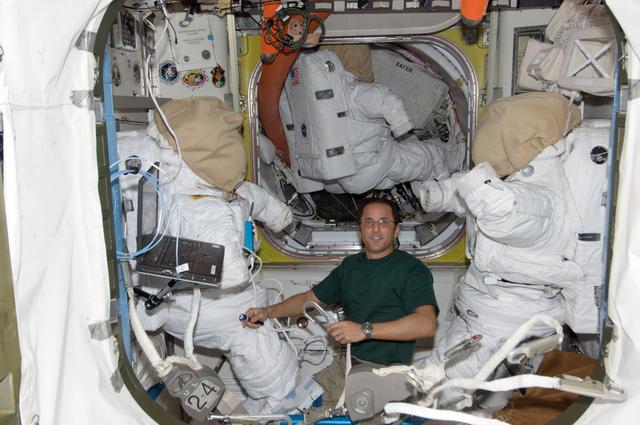 NASA image: FE Acaba works with EVA Equipment in the Airlock