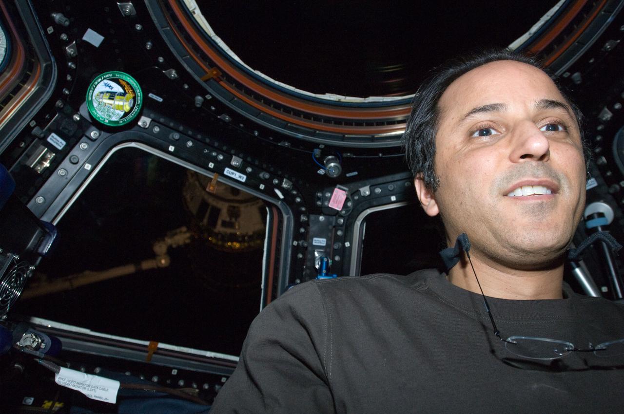 ISS032-E-010613 (27 July 2012) --- NASA astronaut Joe Acaba is pictured in the International Space Station?s Cupola as the unpiloted Japan Aerospace Exploration Agency (JAXA) H-II Transfer Vehicle (HTV-3) approaches the station. Acaba and Japan Aerospace Exploration Agency astronaut Aki Hoshide (out of frame), both Expedition 32 flight engineers, used the station's Canadarm2 robotic arm to capture and berth the HTV-3 to the Earth-facing port of the station's Harmony node. The attachment was completed at 10:34 a.m. (EDT) on July 27, 2012.