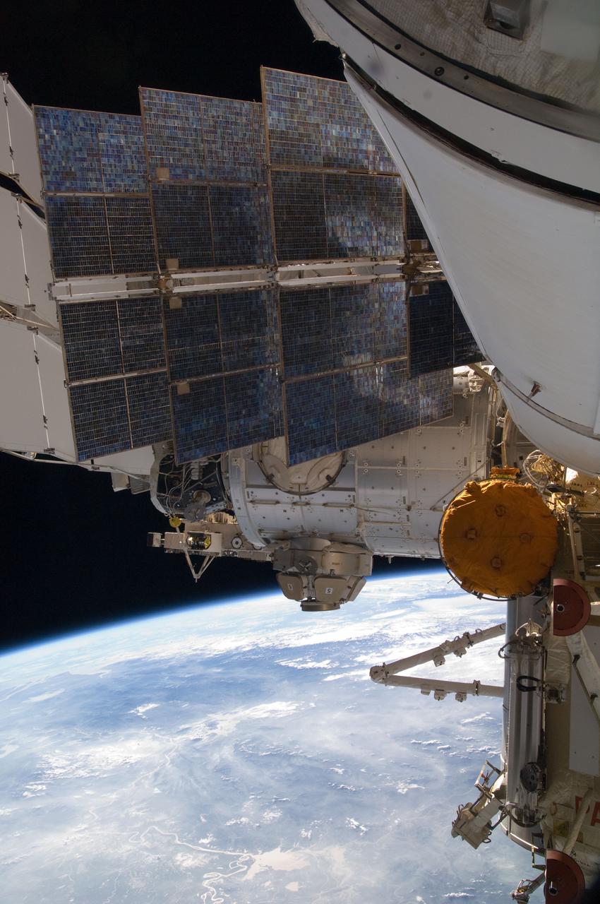 ISS032-E-010639 (28 July 2012) --- A portion of the International Space Station is photographed by an Expedition 32 crew member on the station. Earth?s horizon and the blackness of space provide the backdrop for the scene.