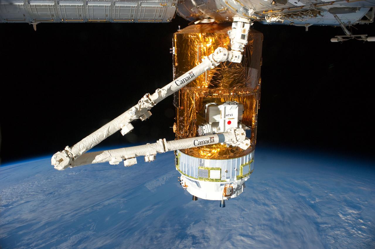 ISS032-E-010858 (29 July 2012) --- The Japan Aerospace Exploration Agency (JAXA) H-II Transfer Vehicle (HTV-3), currently attached to the Earth-facing port of the International Space Station's Harmony node, is featured in this image photographed by an Expedition 32 crew member on the station. Earth’s horizon and the blackness of space provide the backdrop for the scene.