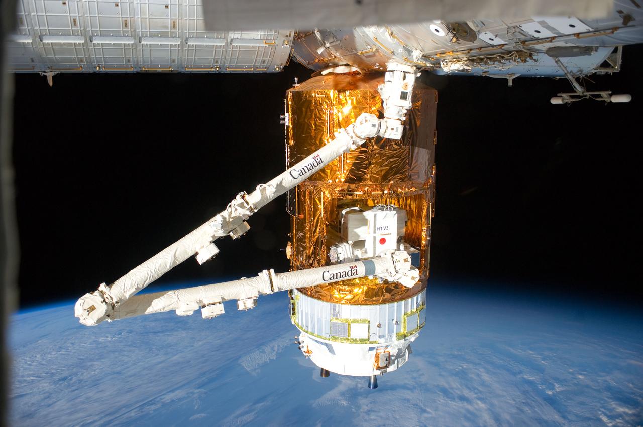 ISS032-E-010859 (29 July 2012) --- The Japan Aerospace Exploration Agency (JAXA) H-II Transfer Vehicle (HTV-3), currently attached to the Earth-facing port of the International Space Station's Harmony node, is featured in this image photographed by an Expedition 32 crew member on the station. Earth’s horizon and the blackness of space provide the backdrop for the scene.