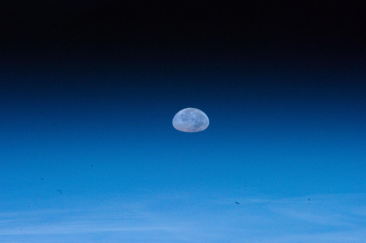 ISS032-E-011476 (1 Aug. 2012) --- One of the Expedition 32 crew members aboard the Earth-orbiting International Space Station captured  this image of the full moon on Aug. 1, 2012.  Because of the home planet's atmosphere, it is not easy at first sighting to recognize the heavenly body as the full moon. Another picture in this series depicts a totally different image of Earth's natural satellite because of the lack of distortion caused by the atmosphere.